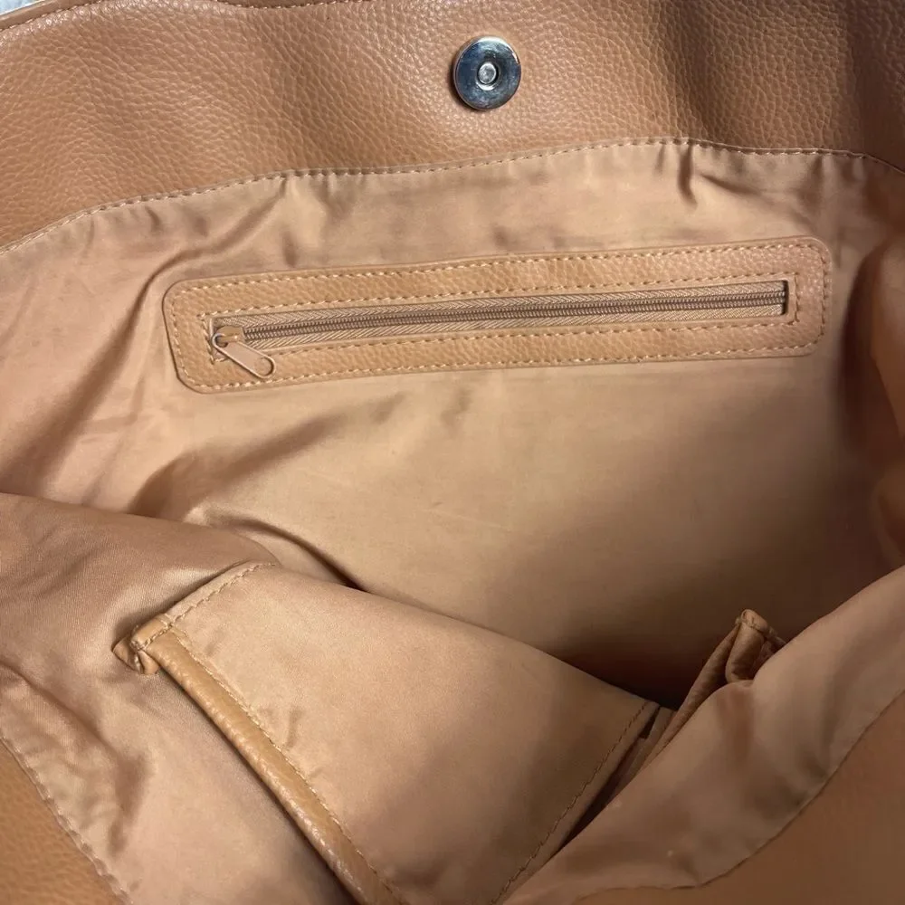 Tyler Rodman beige woven large tote with tan faux leather trim and straps .